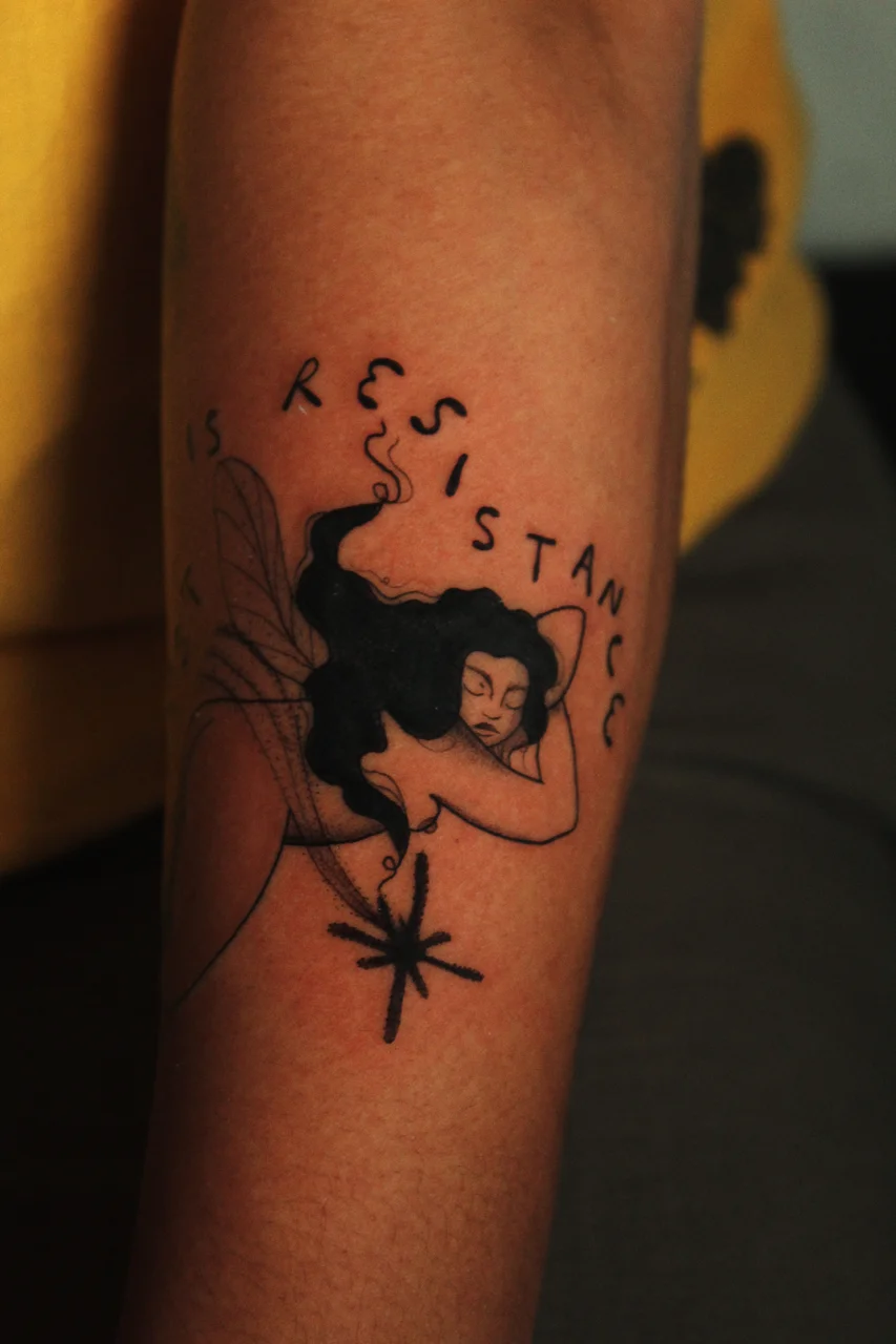 Twin cranes in flight single-needle rib tattoo